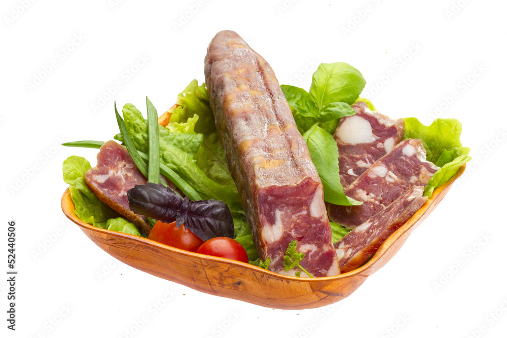 Ripe salami with salad, basil, onion and tomato Ripe salami with salad, basil, onion and tomato