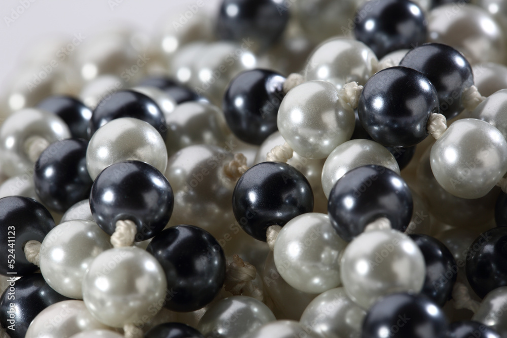 String of black and white pearls String of black and white pearls