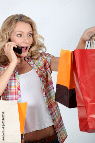 enthusiastic woman after shopping frenzy