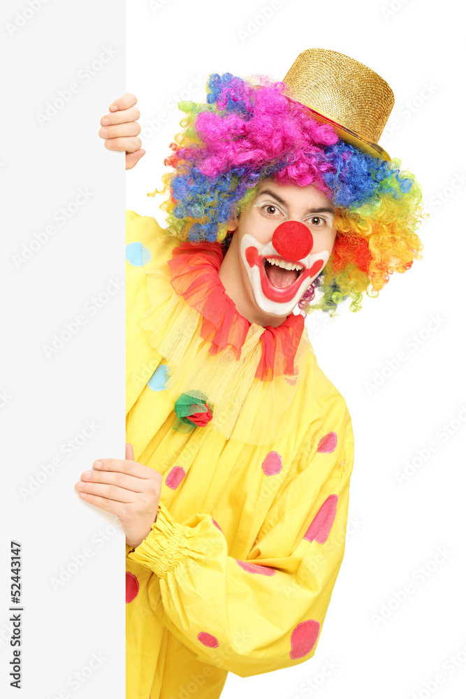 Funny circus clown holding a blank panel Funny circus clown holding a blank panel