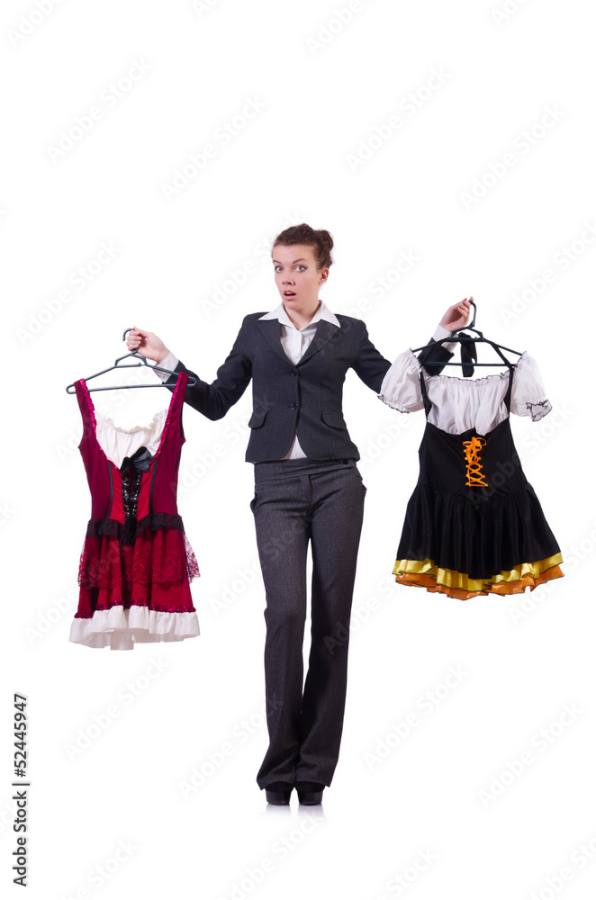 Woman trying to choose dress on white Woman trying to choose dress on white