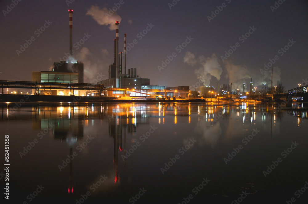 industrial area on the water at night