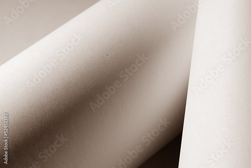 An abstract closeup photo of curve shapes made up of paper