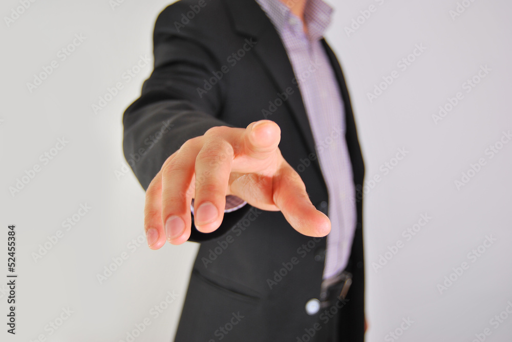 Fototapeta premium Businessman pressing an imaginary button