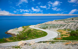 dalmatian part of the Adriatic coast and rocky beach, with blue