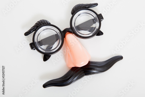 A set of grouch marx glasses on a white background