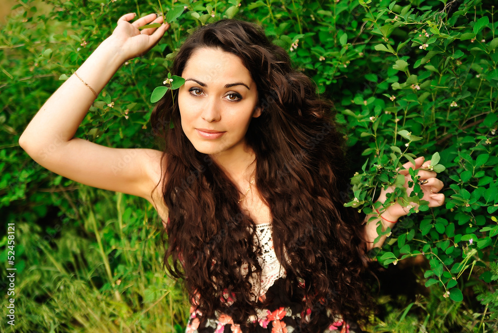 Young beautiful woman in a grass Young beautiful woman in a grass