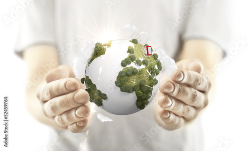 Fototapeta Naklejka Na Ścianę i Meble -  hands holding earth