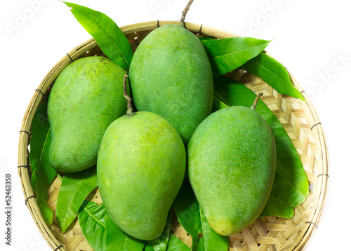 Fresh green mango in basket