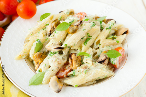 penne pasta with cream sauce and mussels