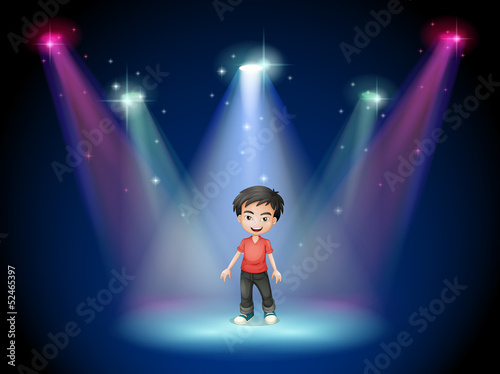 A young actor at the center of the stage