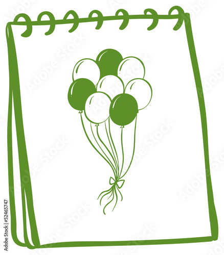 A notebook with a drawing of balloons at the cover page