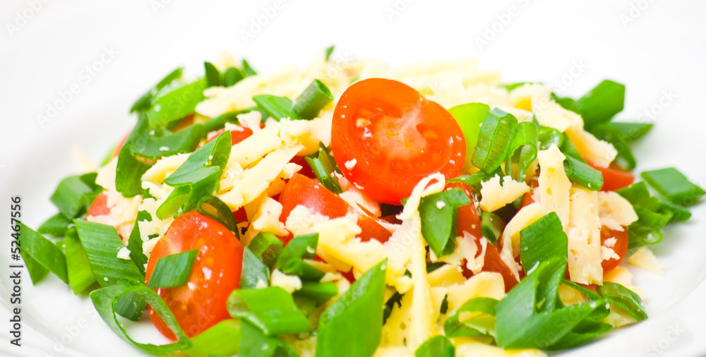 Fresh vegetable salad with cherry tomatoes, green onions, cheese Fresh vegetable salad with cherry tomatoes, green onions, cheese