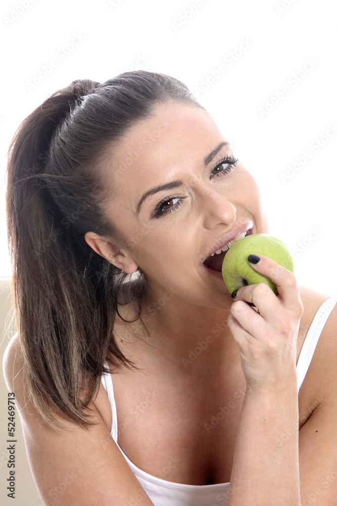 Model Released. Young Woman Eating an Apple Model Released. Young Woman Eating an Apple