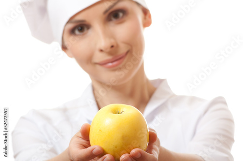 Smiling woman cook with apple, isoladed on white background photo