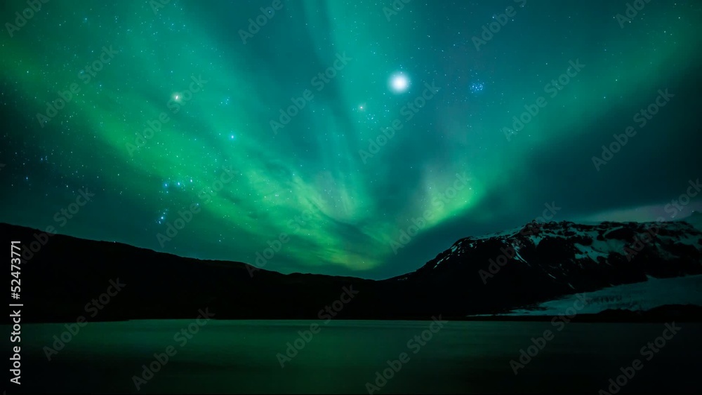 Northern lights (Aurora borealis) over the lake, Iceland