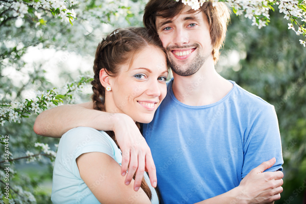 Fototapeta premium Young attractive couple together outdoors