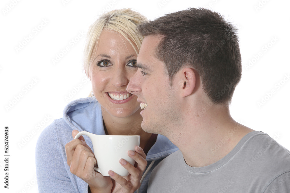 Model Released. Young Couple Relaxing with a Cup of Tea Model Released. Young Couple Relaxing with a Cup of Tea
