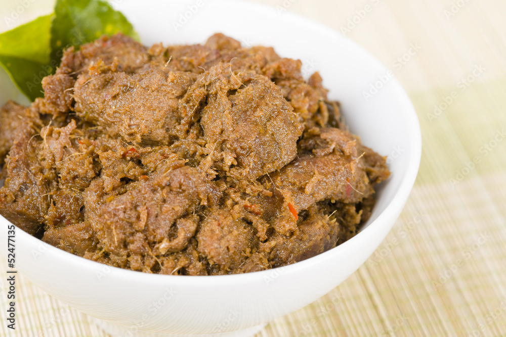 Rendang Daging - Dried beef curry with coconut milk and spices. Rendang Daging - Dried beef curry with coconut milk and spices.