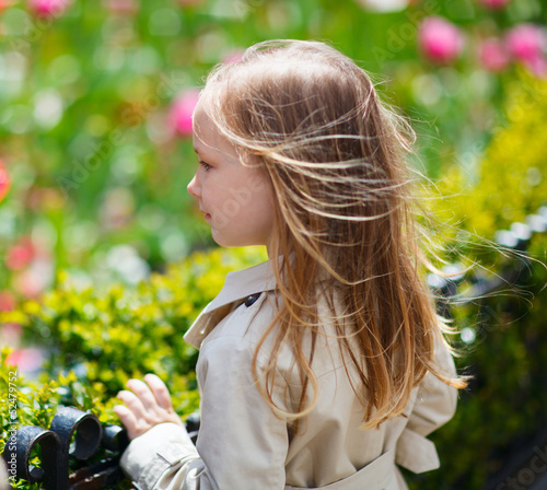 Little girl outdoors on spring day