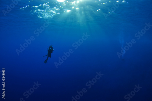 Scuba diver with negative space for your text © uwimages