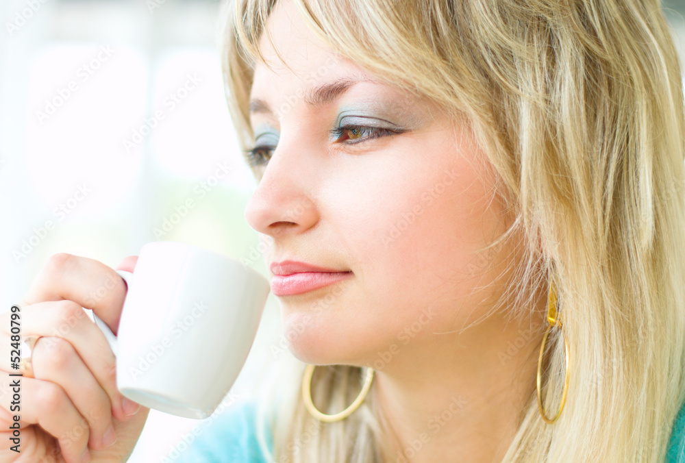 young woman drinking coffee young woman drinking coffee