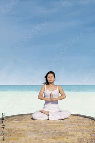 Meditating on the beach