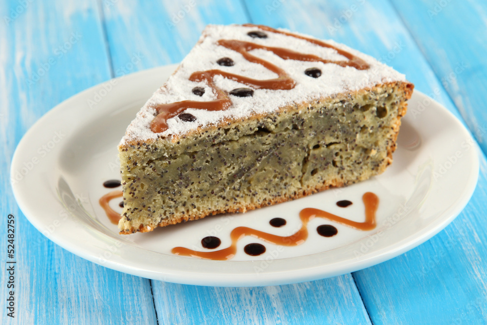 Delicious poppy seed cake on table close-up Delicious poppy seed cake on table close-up