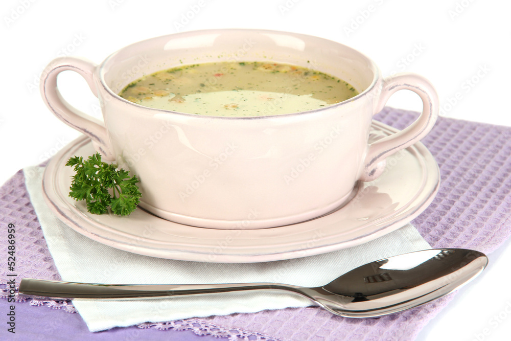 Nourishing soup with vegetables in pan isolated on white Nourishing soup with vegetables in pan isolated on white