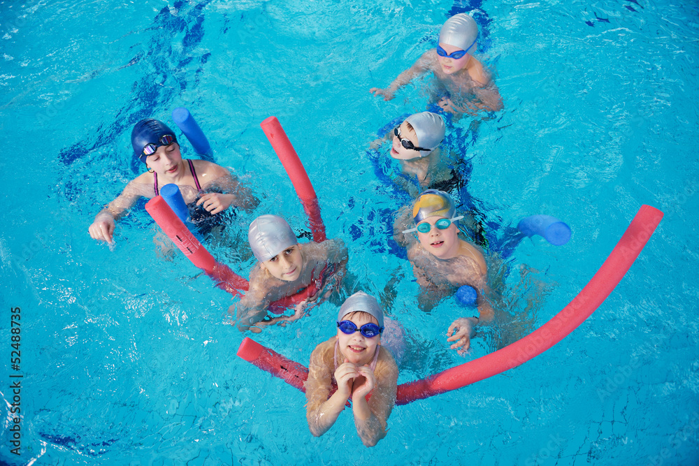 happy children group  at swimming pool