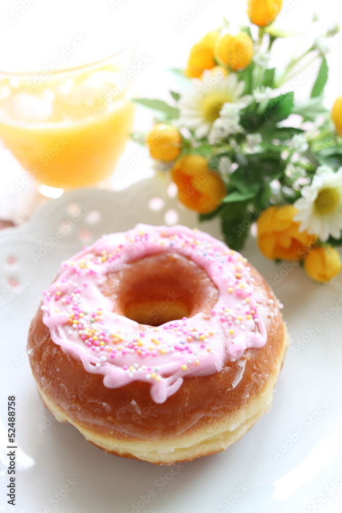 homemade strawberry donut and orange juice homemade strawberry donut and orange juice