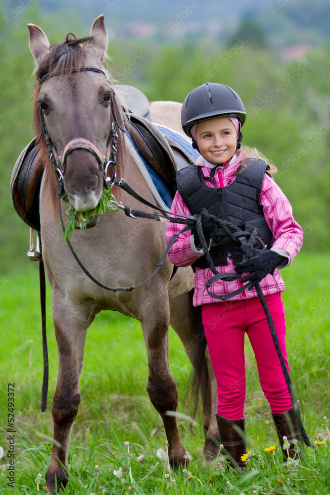 Obraz premium Horse and lovely equestrian girl.