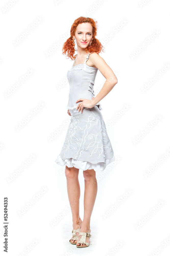 beautiful and young woman on an isolated white background