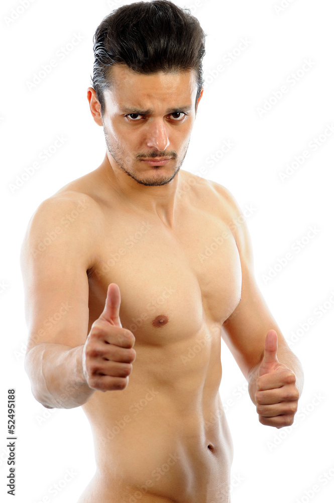 Muscular Man pointing OK isolated white background Muscular Man pointing OK isolated white background