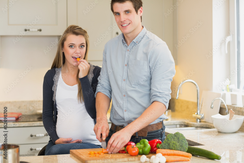 Man cooking for his pregnant wife