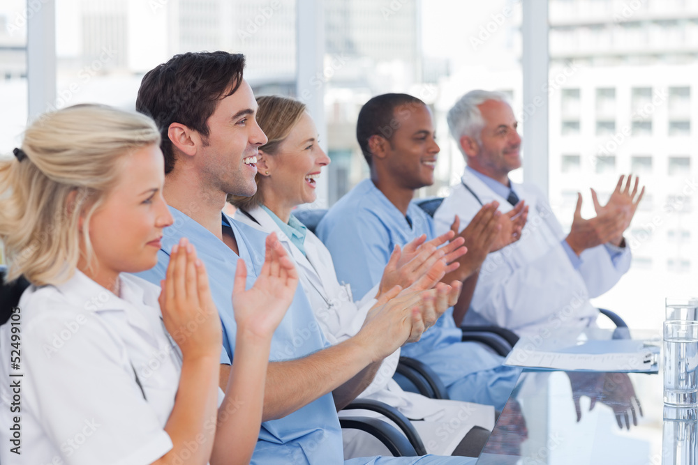 Doctors clapping their hands Doctors clapping their hands