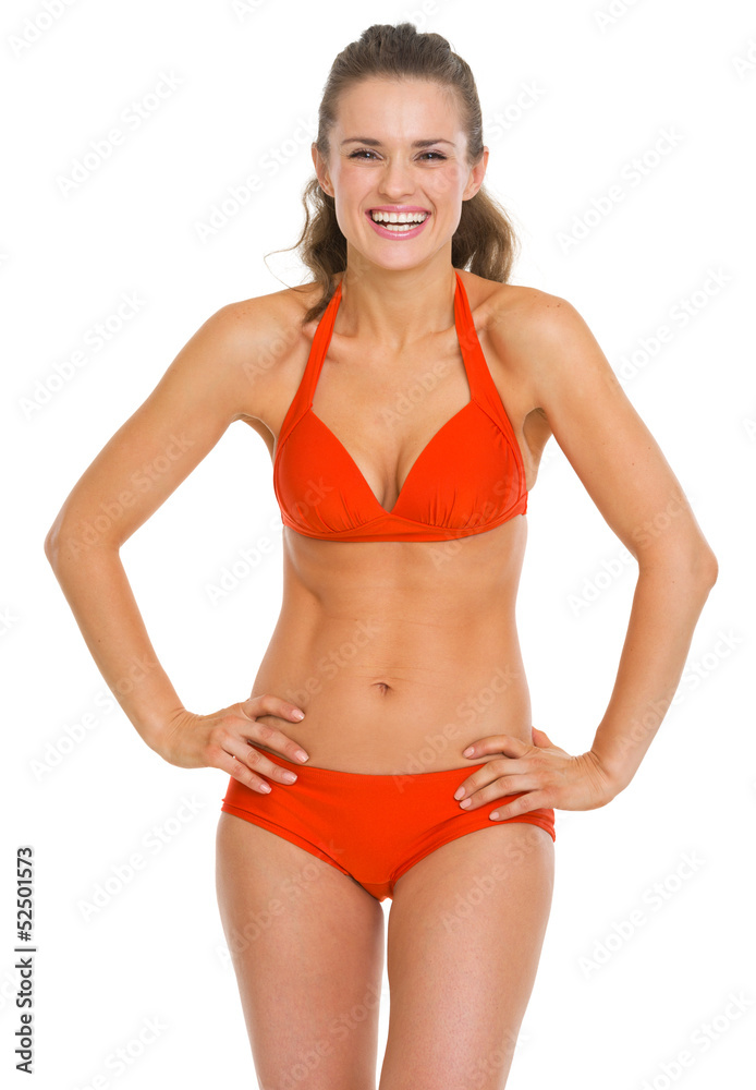 Fototapeta premium Portrait of smiling young woman in swimsuit