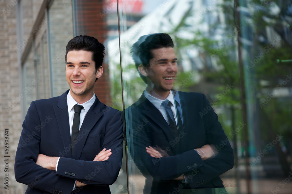 Portrait of a happy businessman smiling outdoors Portrait of a happy businessman smiling outdoors