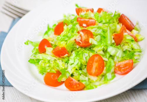 Fresh vegetable salad with cherry tomatoes and cabbage