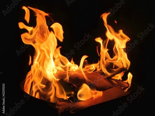 Yellow fire plasma on black background