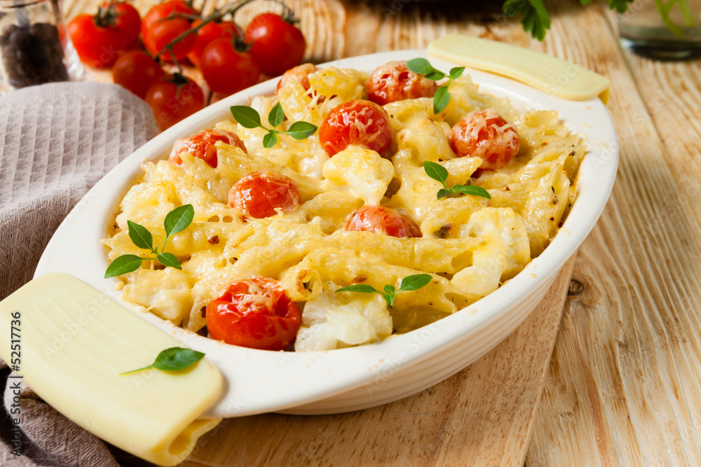 penne under the grated cheese with cherry tomatoes penne under the grated cheese with cherry tomatoes