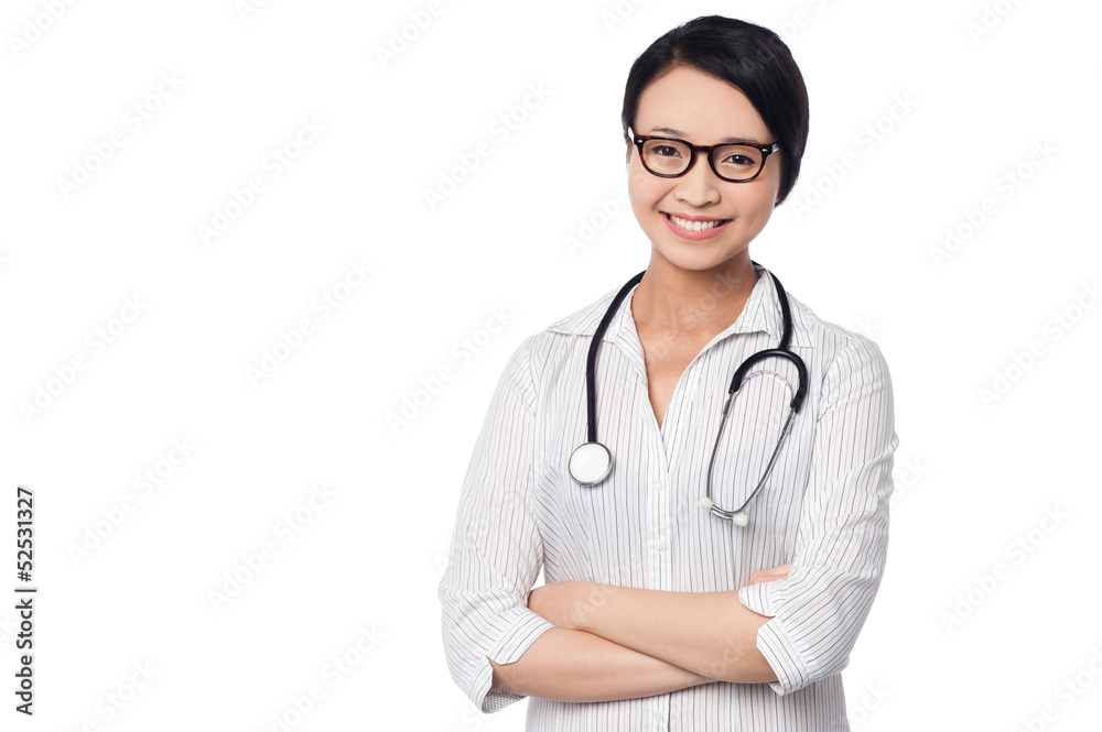 Young pretty female doctor with arms folded Young pretty female doctor with arms folded