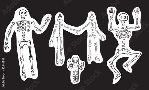 Skeletons on black background