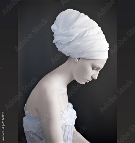female model  looking as marble statue