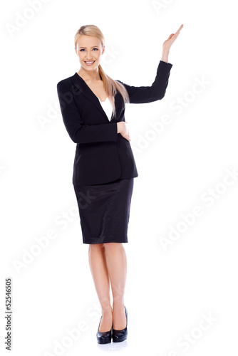 Beautiful blond business woman presenting copy space