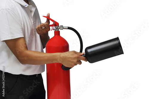 A man showing how to use fire extinguisher isolated over white b