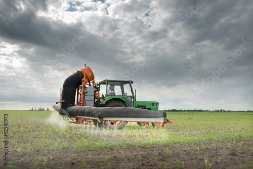 Tractor spraying