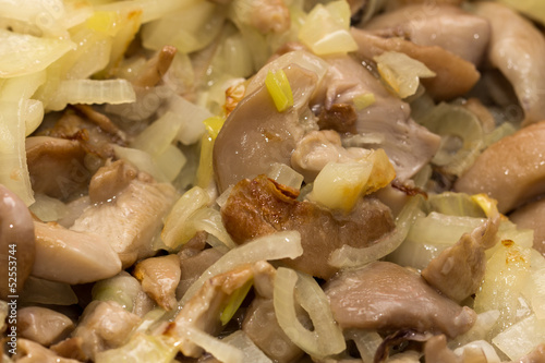 background of mushrooms fried in a pan