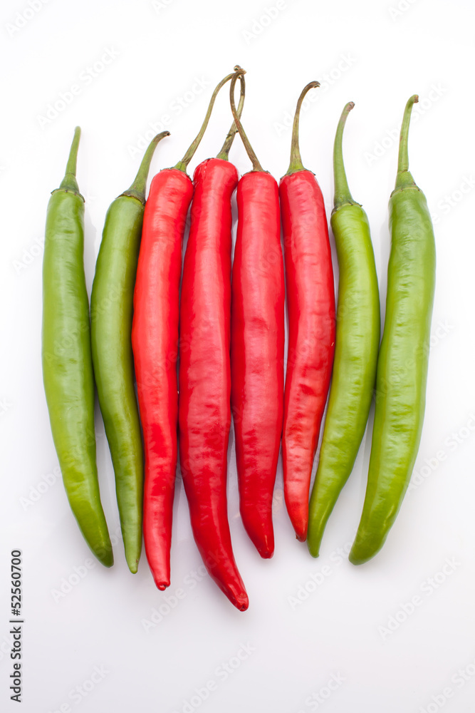 Red and green chili peppers isolated on the white