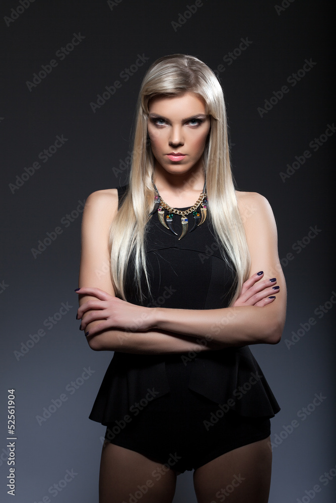 Portrait of young strict blonde looking at camera Portrait of young strict blonde looking at camera